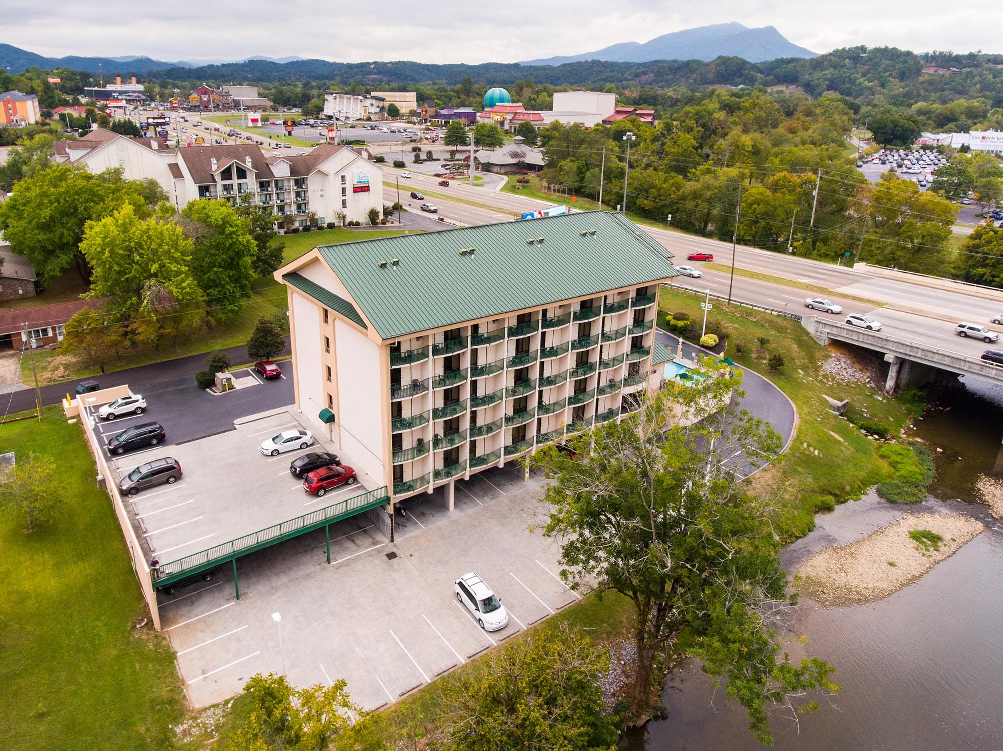 Drone image of hotel beside main road